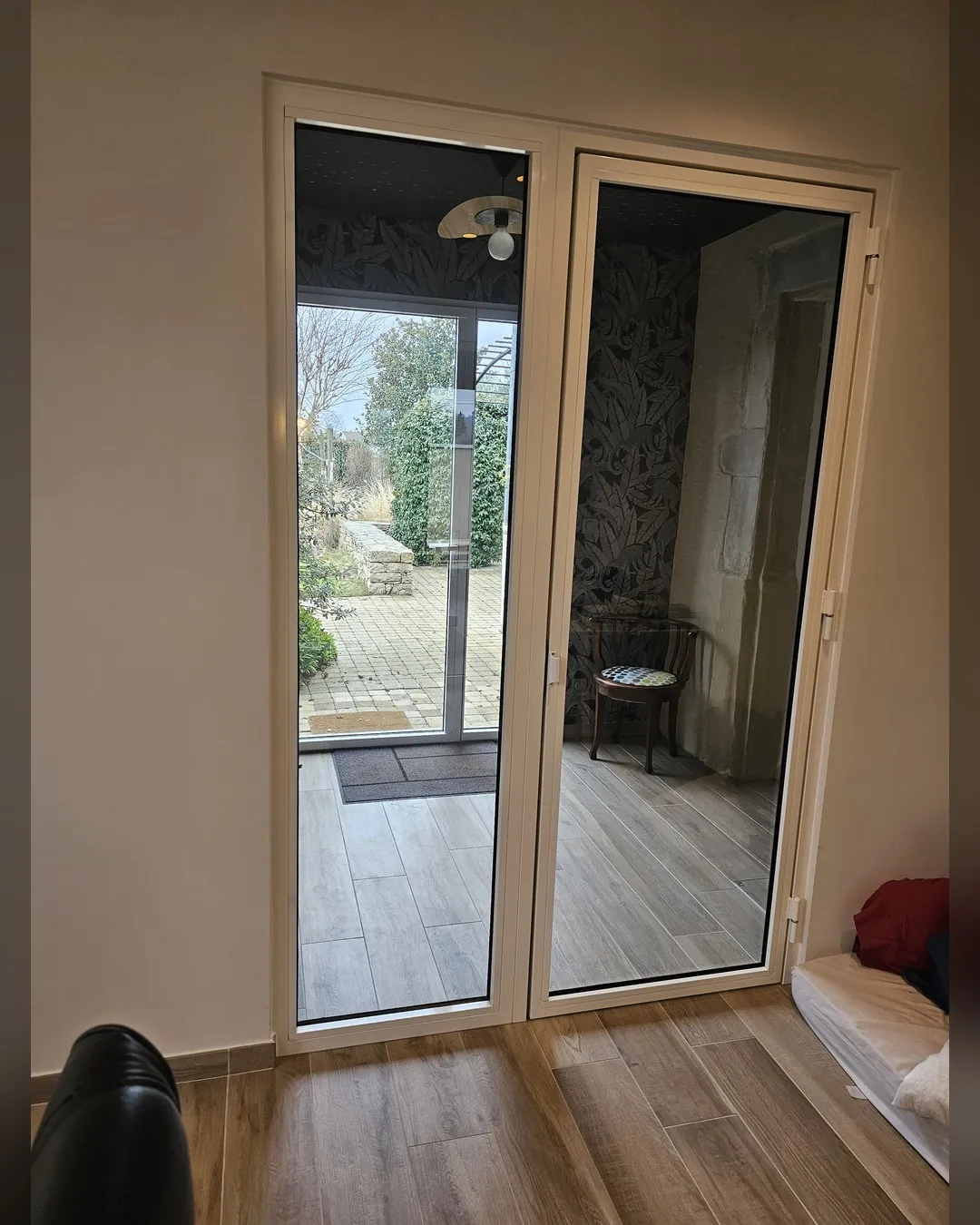Double porte-verrière donnant sur jardin